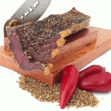 susmans beef biltong on a chopping board